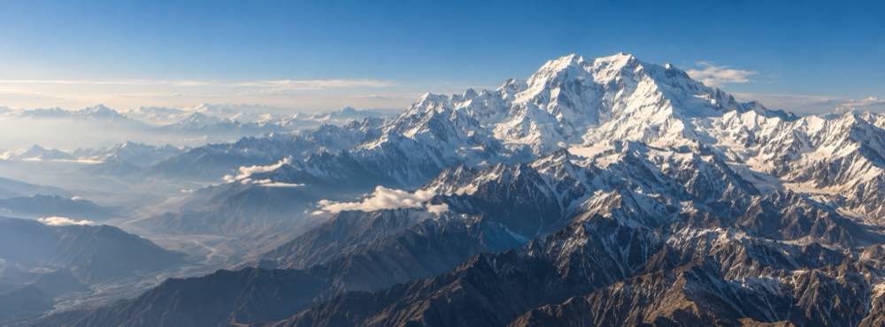 Snow peaks of the Karakoram rising above the valleys